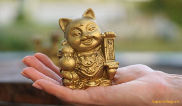 Pisica Feng Shui Maneki Neko, simbol tradițional al norocului și oportunităților