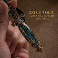Detaliu mecanism rotativ al colierului Dzi cu 9 ochi